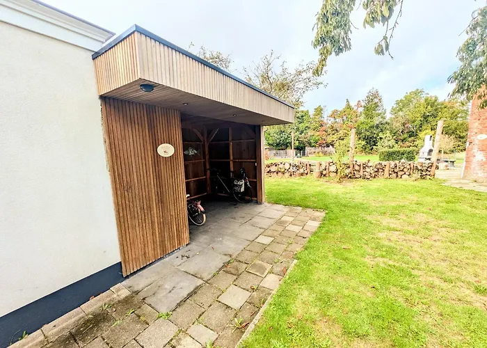 Volledig gerenoveerde luxe gastsuite met ontbijt